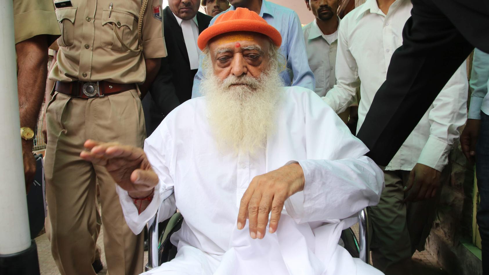 Spiritual leader Asaram Bapu accused in a sexual assault case arrives on wheel chair at the district session court for hearing. (Photo by Sunil Verma / Pacific Press)