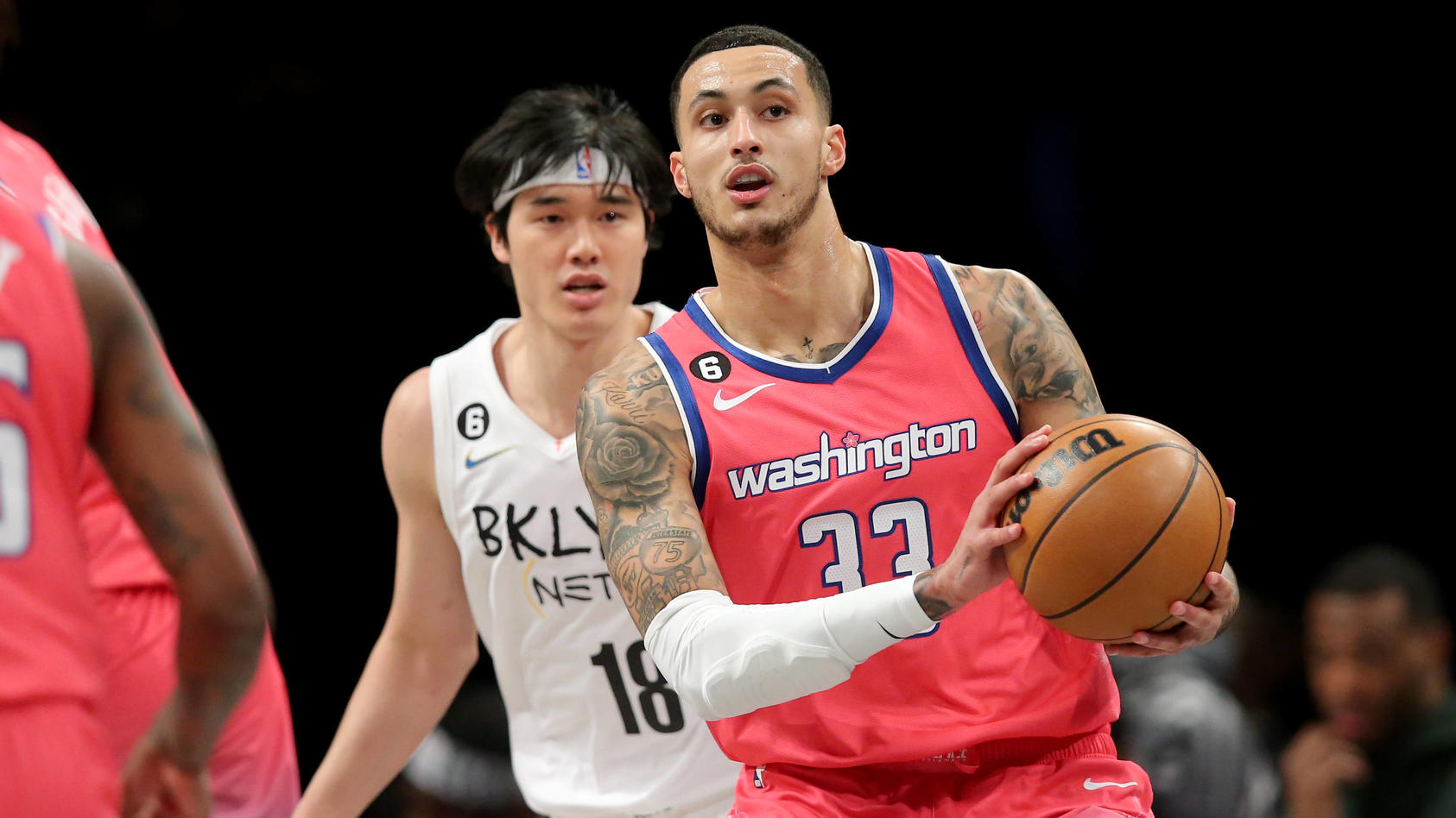 NBA, Basketball Herren, USA Washington Wizards at Brooklyn Nets Feb 4, 2023 Brooklyn, New York, USA Washington Wizards forward Kyle Kuzma 33 controls the ball against Brooklyn Nets forward Yuta Watanabe 18 during the first quarter at Barclays Center.