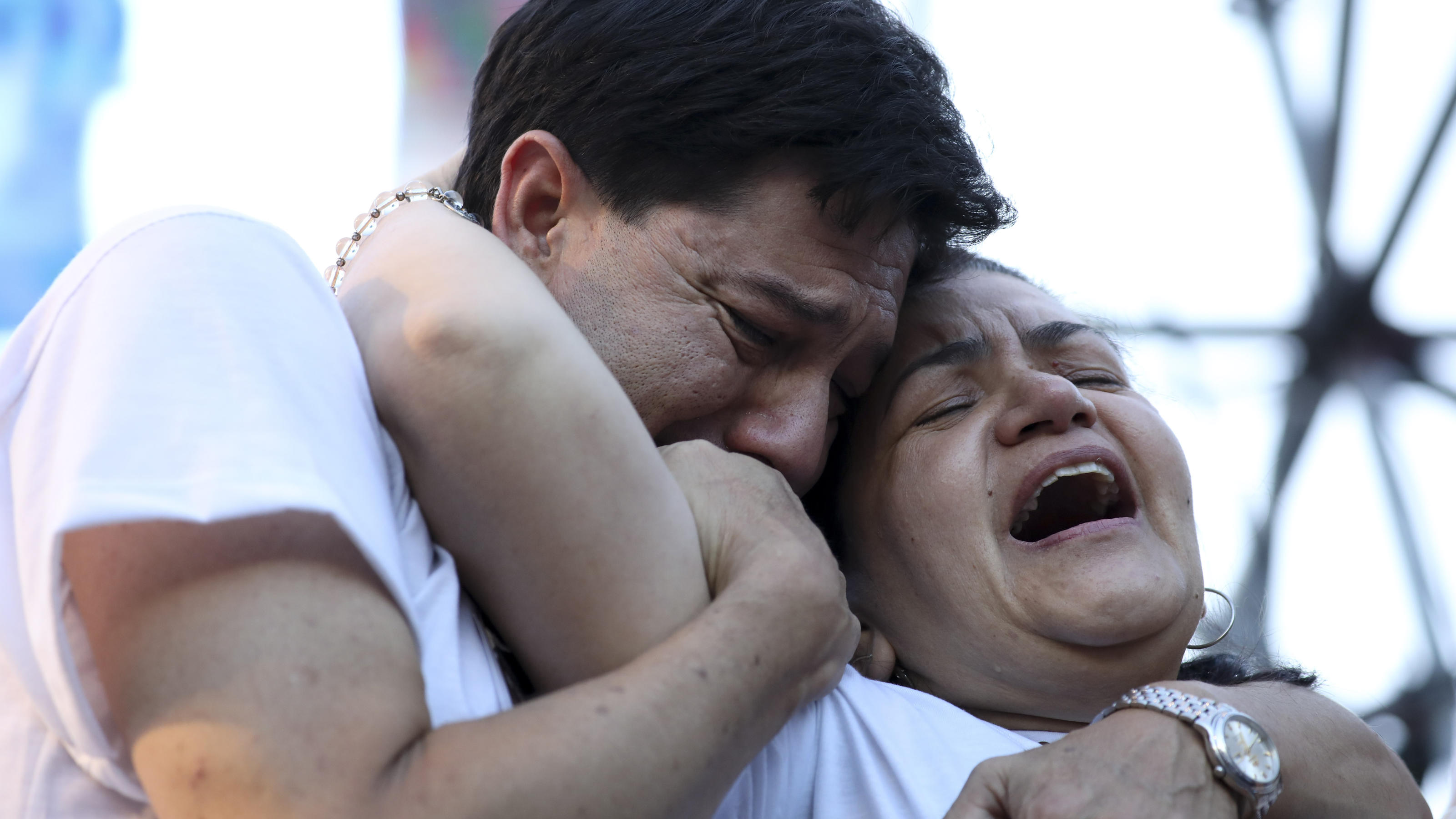 Graciela Sosa and husband her Silvino Baez lament the violent death of their son Fernando Baez Sosa, outside Congress where people gathered to demand justice one month after the death of the 18-year-old, in Buenos Aires, Argentina, Tuesday, Feb. 18, 