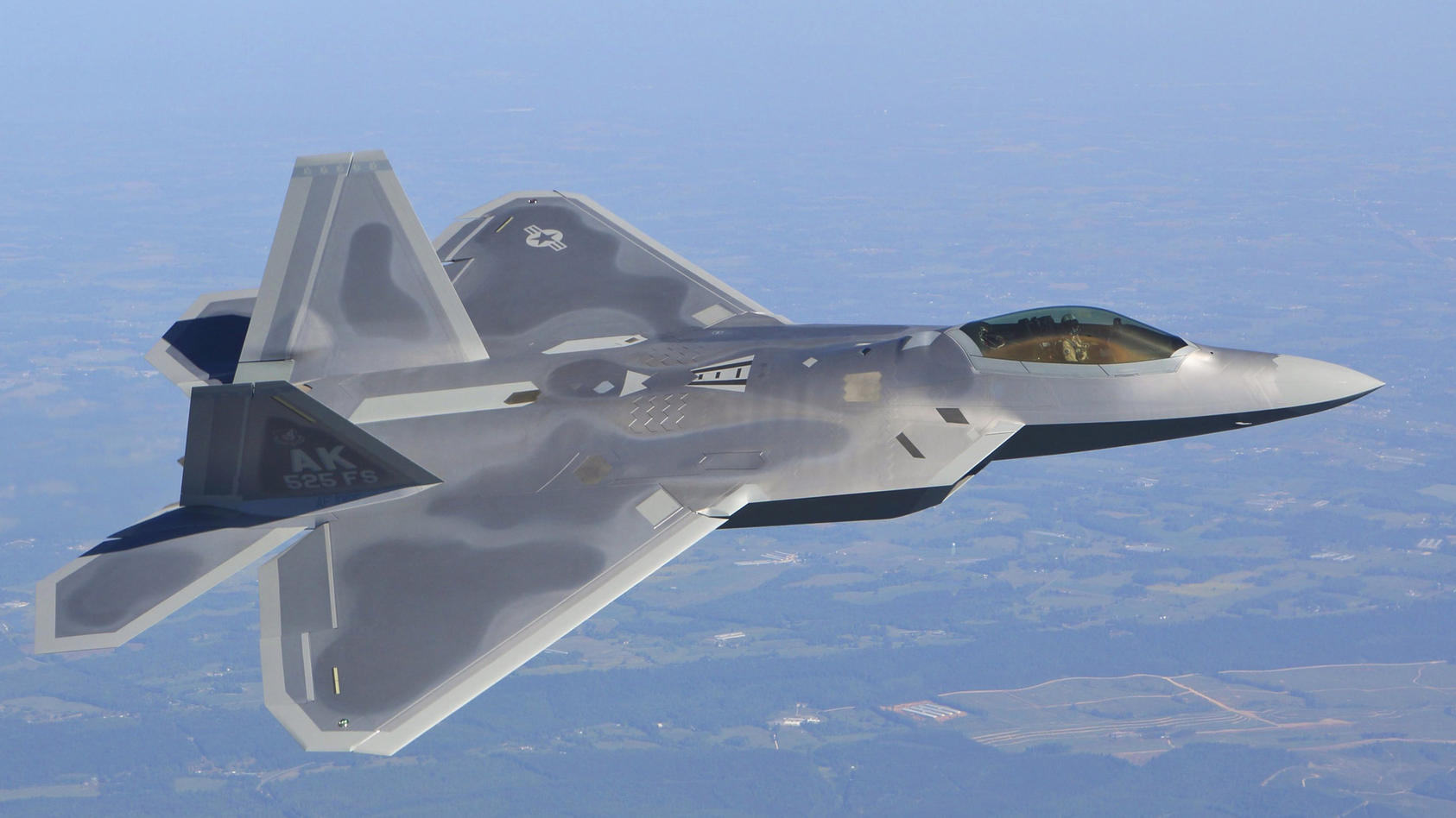 FILE A handout image dated 24 April 2012 and made available 24 October 2012 by Lockheed Martin, showing two F-22 fighter planes taking their final company flight around the Metro Atlanta Area, passing down town Atlanta, Stone Mountain, Lake Lanier, a
