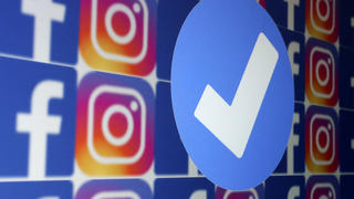 A blue verification badge and the logos of Facebook and Instagram are seen in this picture illustration taken January 19, 2023. REUTERS/Dado Ruvic/Illustration