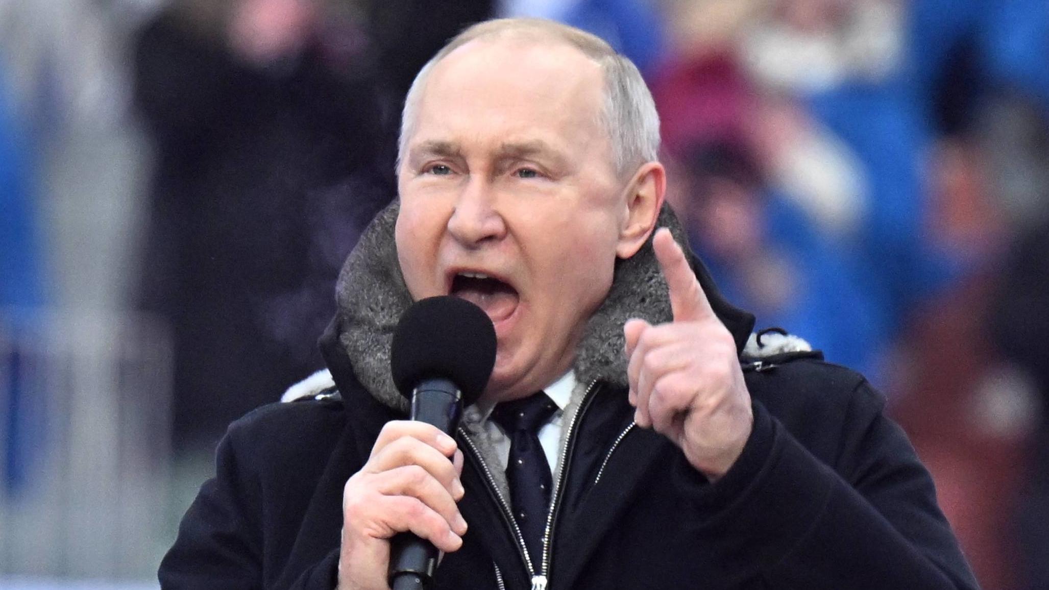 Russia Putin Military Support Concert 8375898 22.02.2023 Russian President Vladimir Putin attends a concert dedicated to Russian servicemen taking part in the military operation in Ukraine on the eve of Defender of Fatherland Day at the Luzhniki stad