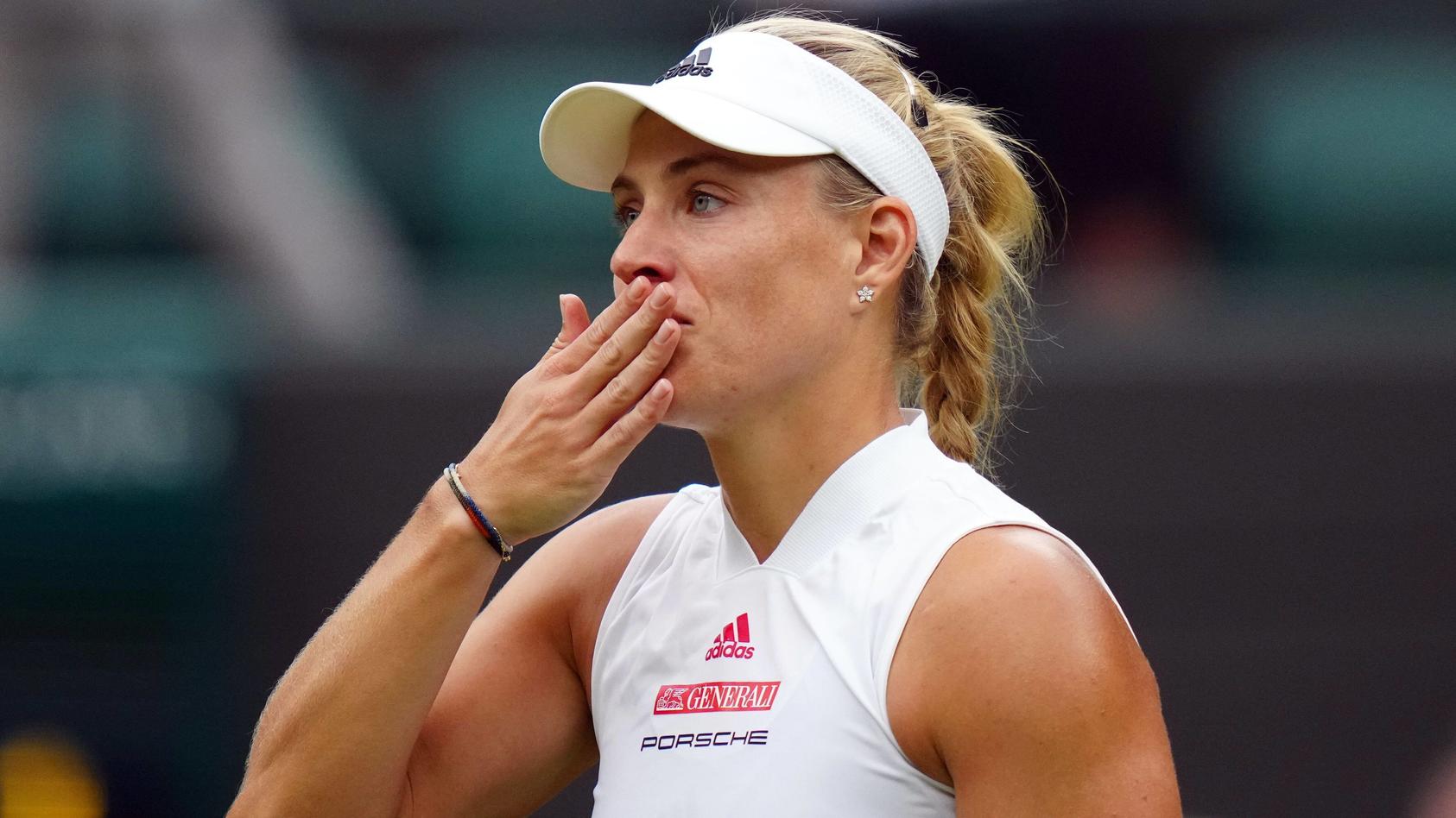 Mandatory Credit: Photo by Shutterstock 12197712cc Angelique Kerber celebrates victory in her quarter-final match Wimbledon Tennis Championships, Day 8, The All England Lawn Tennis and Croquet Club, London, UK - 06 Jul 2021 Wimbledon Tennis Champions