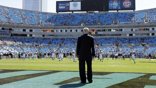 FILE - Carolina Panthers owner Jerry Richardson looks on as his team warms up before an NFL football game against the New York Giants in Charlotte, N.C., Sunday, Sept. 22, 2013. Richardson, the Panthers founder and for years one of the NFLâ€™s most influential owners until a scandal forced him to sell the team, died peacefully Wednesday night, March 1, 2023, at his Charlotte home, the team said in a statement. He was 86. (AP Photo/Bob Leverone, File)