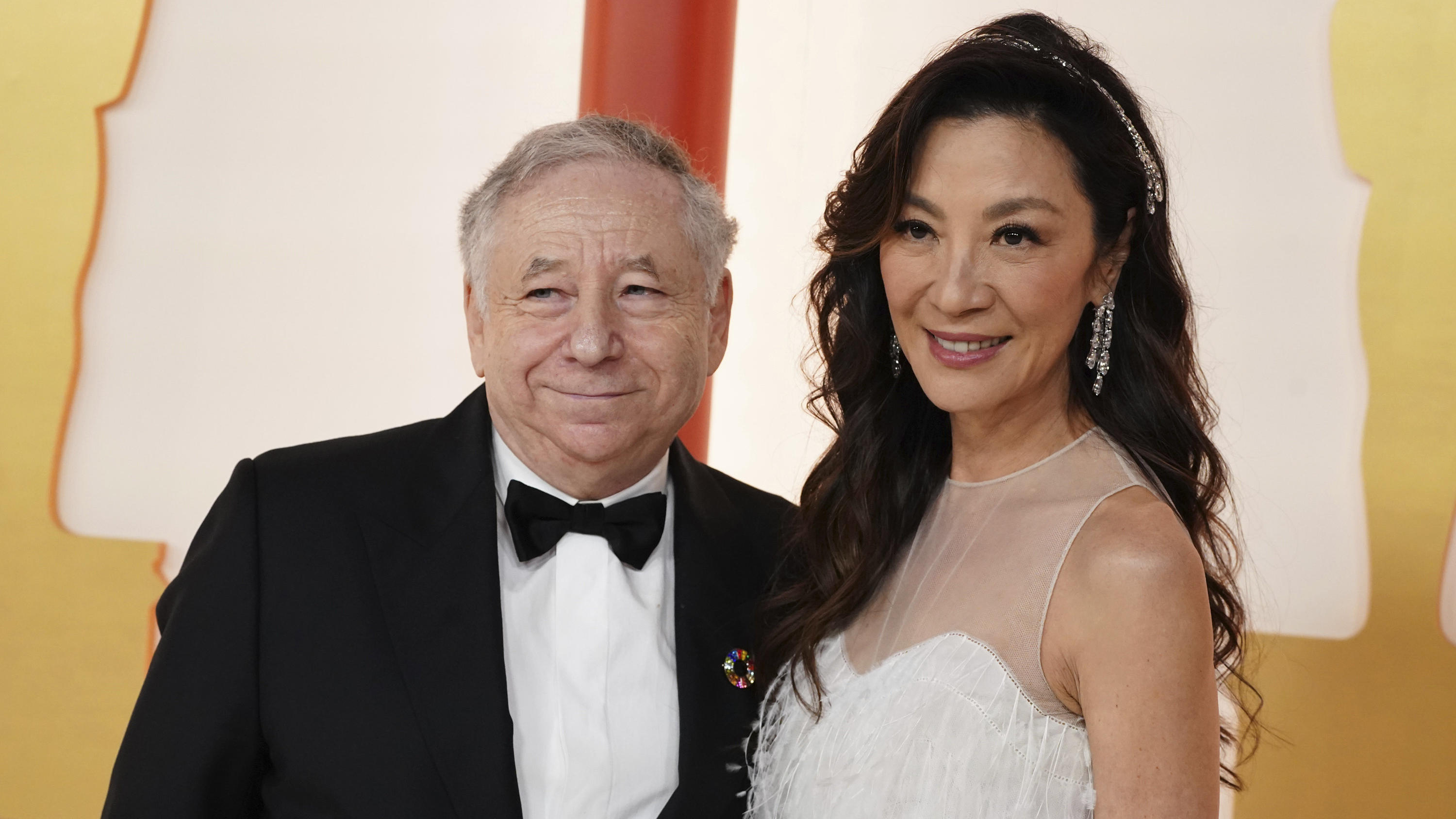 Jean Todt, left and Michelle Yeoh arrive at the Oscars on Sunday, March 12, 2023, at the Dolby Theatre in Los Angeles. (Photo by Jordan Strauss/Invision/AP)