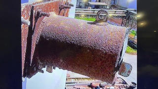 This image made on March 14, 2023, from the 2022 video provided by the Prachinburi Provincial Public Relations Office,  shows a radioactive cylinder, a steel tube, 30 cm (12 inches) long and 13 cm (5 inches) diameter that has gone missing from a steam power plant in Thailand's eastern province of Prachinburi. The video was taken in December 2022. (The Prachinburi Provincial Public Relations Office via AP)