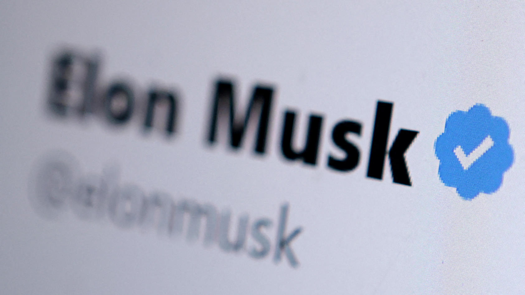 FILE PHOTO: Elon Musk Twitter account verification badge is seen in this illustration taken November 4, 2022. REUTERS/Dado Ruvic/Illustration/File Photo