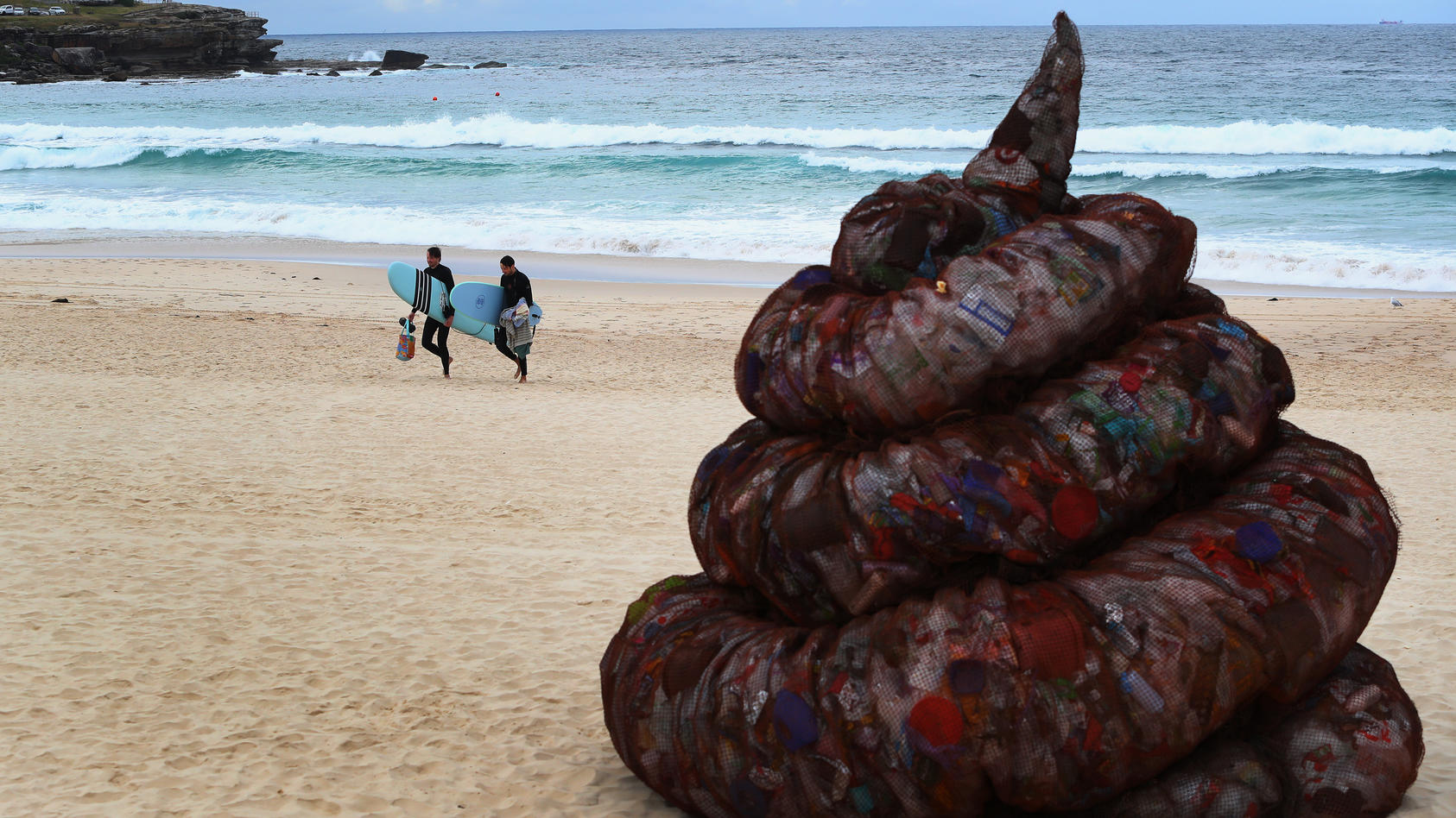 SYDNEY, AUSTRALIA - JUNE 05: A sculpture titled 'Plastic pile of sh!t, 2023' presented by Better Packaging Co. is seen on display at Bondi Beach on June 05, 2023 in Sydney, Australia. The four-metre-high sculpture is made out of recycled plastic and 