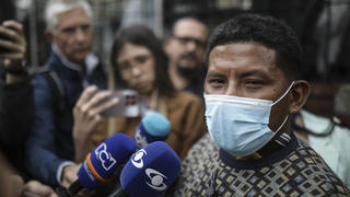 Manuel Ranoque, the father of two of the youngest Indigenous children who survived an Amazon plane crash that killed three adults, and then braved the jungle for 40 days before being found alive, speaks to the media from the entrance of the military hospital where the children are receiving medical attention, in Bogota, Colombia, Sunday, June 11, 2023. (AP Photo/Ivan Valencia)