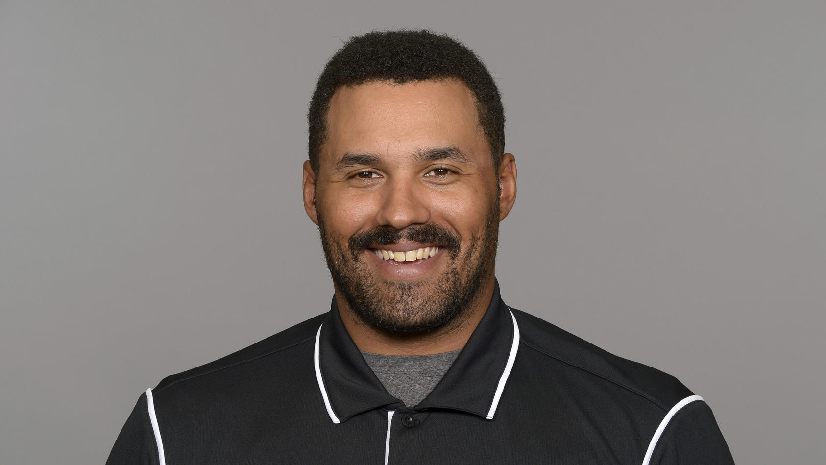 FILE - Kevin Maxen of the Jacksonville Jaguars NFL football team poses for a photo in June 2021. Maxen, an associate strength coach with the Jaguars, has become the first male coach in a major U.S.-based professional league to come out as gay. Maxen 