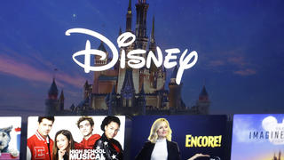 FILE - In this Nov. 13, 2019, photo, a Disney logo forms part of a menu for the Disney Plus movie and entertainment streaming service on a computer screen in Walpole, Mass. Password-sharing crackdowns are becoming more and more common in the streaming world today. And Disney Plus is following suit. In an email sent to the users in Canada, Disney announced upcoming restrictions on Canadian subscribersâ€™ ability to share login credentials outside of their household â€” set to go into effect for most Canadian users on Nov. 1, 2023.   (AP Photo/Steven Senne, File)
