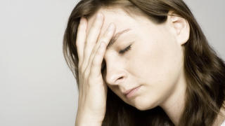 Woman  suffering from headache