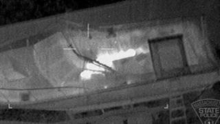 An aerial infrared image shows the outline of Dzhokhar Tsarnaev in a boat during the manhunt in Watertown, Massachusetts, April 19, 2013, courtesy of the Massachusetts State Police. A telephone call from a resident led police to the boat where the suspect, identified as Dzhokhar Tsarnaev, was hiding and a police helicopter detected a heat signal that confirmed his presence there, said Boston Police Commissioner Ed Davis.  REUTERS/Massachusetts State Police/Handout  (UNITED STATES - Tags: CRIME LAW TPX IMAGES OF THE DAY) FOR EDITORIAL USE ONLY. NOT FOR SALE FOR MARKETING OR ADVERTISING CAMPAIGNS. THIS IMAGE HAS BEEN SUPPLIED BY A THIRD PARTY. IT IS DISTRIBUTED, EXACTLY AS RECEIVED BY REUTERS, AS A SERVICE TO CLIENTS