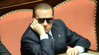 epa03692254 (FILE) A file picture dated 16 March 2013 of the former Italian prime minister Silvio Berlusconi, who only left hospital in Milan the day before after eye treatment, wears sunglasses as he takes his seat after casting his vote for a new Italian Senate president ,in Rome, Italy. An Italian appeals court on 08 May 2013 upheld a tax fraud conviction against former premier Silvio Berlusconi. In October 2012, Berlusconi was sentenced to four years' imprisonment with a three-year remit; banned from holding public office for five years; and excluded from managerial positions in private companies for three years. EPA/ALESSANDRO DI MEO
