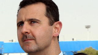 epa03107187 (FILE) A file photograph dated 15 July 2007, shows Syrian President Bashar al-Assad waiting for UAE President Sheikh Khalifa Bin Zayed Al Nahyan, in Damascus, Syria. Syrian President Bashar al-Assad decreed on 15 February that a referendum would be held on 26 February on a draft constitution for the country. EPA/YOUSSEF BADAWI