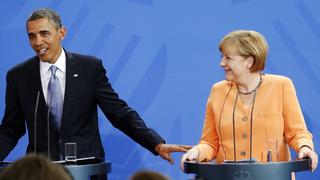 U.S. President Barack Obama and German Chancellor Angela Merkel hold a joint news conference at the Chancellery in Berlin June 19, 2013.REUTERS/Kevin Lamarque (GERMANY - Tags: POLITICS)