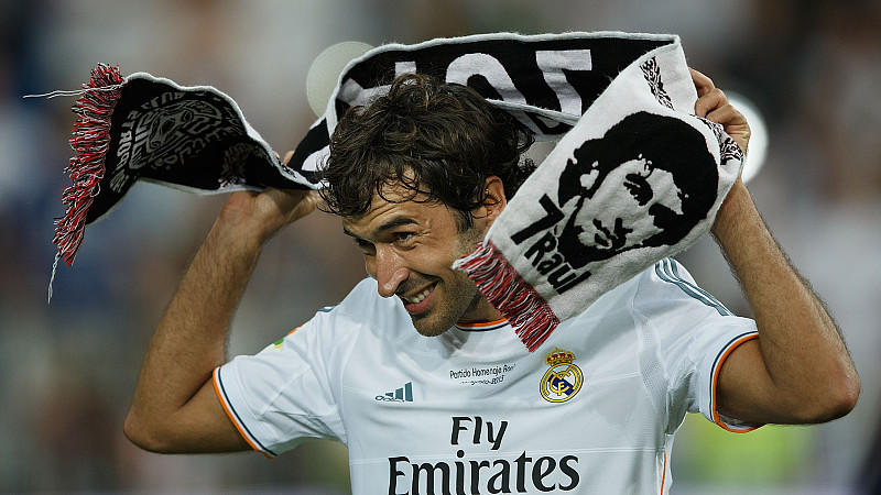 MADRID, SPAIN - AUGUST 22:  Former Real Madrid player Raul, donning a towel bearing his likeness, acknowledges the crowd after the Santiago Bernabeu Trophy match between Real Madrid CF and Al-Sadd at Estadio Santiago Bernabeu on August 22, 2013 in Ma