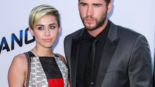 (FILE) Miley Cyrus and Liam Hemsworth call off their engagement, announced Monday, September 16, 2013. Miley Cyrus and Liam Hemsworth are pictured at the "Paranoia" Los Angeles premiere held at DGA Theater on August 8, 2013 in Los Angeles, California.