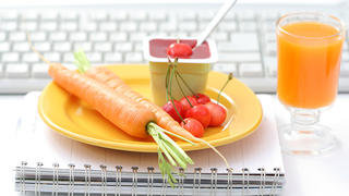 healthy snack in the office - yogurt and fresh fruits and vegetables