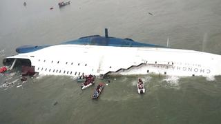 South Korean ferry "Sewol" is seen sinking in the sea off Jindo April 16, 2014, in this picture provided by Korea Coast Guard and released by Yonhap. Almost 300 people were missing after a ferry sank off South Korea on Wednesday, the coastguard said, in what could be the country's biggest peacetime disaster in nearly 20 years. REUTERS/Korea Coast Guard/Yonhap (SOUTH KOREA - Tags: DISASTER MARITIME IMAGES OF THE DAY) ATTENTION EDITORS - NO SALES. NO ARCHIVES. FOR EDITORIAL USE ONLY. NOT FOR SALE FOR MARKETING OR ADVERTISING CAMPAIGNS. THIS PICTURE WAS PROCESSED BY REUTERS TO ENHANCE QUALITY. AN UNPROCESSED VERSION WILL BE PROVIDED SEPARATELY. SOUTH KOREA OUT. NO COMMERCIAL OR EDITORIAL SALES IN SOUTH KOREA