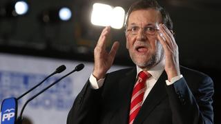 Spain's Prime Minister Mariano Rajoy speaks at a People's Party conference in the Catalonia capital of Barcelona November 29, 2014. Catalonia's two main parties on Wednesday moved a step closer to calling a snap regional election they want to use as a proxy for a referendum on independence from Spain. Rajoy on Nov. 12 urged Catalonia to seek a constitutional reform to resolve its political problems with Madrid but he ruled out talks on a possible referendum on independence. REUTERS/Gustau Nacarino (SPAIN - Tags: POLITICS)