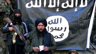 FILE - epa04589039 An image made from a video released by the Islamic State (IS) on 27 January 2015 purportedly showing Hafiz Said Khan (C) head of the IS branch in Pakistan and Afghanistan, at an undisclosed location at Pak-Afghan border. IS spokesman Muhammad al-Adnani announced in an audio recording on 26 January the formation of a branch of the group in the Afghanistan and Pakistan region, to be headed by a militant he named as Hafiz Said Khan. EPA/ISLAMIC STATE / HANDOUT ATTENTION EDITORS : EPA IS USING AN IMAGE FROM AN ALTERNATIVE SOURCE AND CANNOT PROVIDE CONFIRMATION OF CONTENT, AUTHENTICITY, PLACE, DATE AND SOURCE. HANDOUT EDITORIAL USE ONLY/NO SALES (zu dpa "IS oder Al-Kaida? - Streit in Somalias Al-Shabaab-Miliz entbrannt" am 13.03.2015) +++(c) dpa - Bildfunk+++
