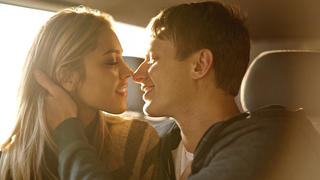 Shot of an affectionate young couple about to kiss in a car