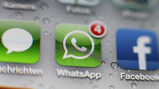 Creative / Feature: WhatsApp-Icon auf einem iPhone