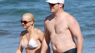 Anna Faris wearing a hot white bikini was spotted with Chris Pratt enjoying a dip in the Ocean while making a visit to the Maui Film Festival.