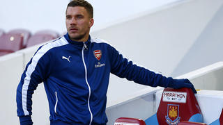 LONDON, ENGLAND - DECEMBER 28:  Lukas Podolski of Arsenal takes his seat on the bench before the Barclays Premier League match between West Ham United and Arsenal at Boleyn Ground on December 28, 2014 in London, England.  (Photo by Julian Finney/Getty Images)