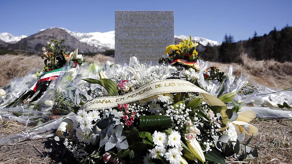 A wreath of flowers to the memory of victims from Spain is seen at the memorial for the victims of the air disaster in the village of Le Vernet, near the crash site of the Airbus A320 in French Alps March 27, 2015. A young German co-pilot barricaded