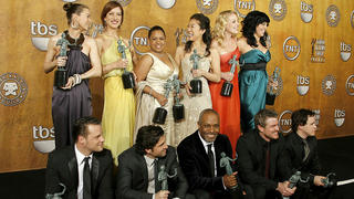 LOS ANGELES, CA - JANUARY 28:  (L-R top) Actresses Ellen Pompeo, Kate Walsh, Chandra Wilson, Sandra Oh, Katherine Heigl, Sara Ramirez (L-R bottom) actors Justin Chambers, Patrick Dempsey, James Pickens Jr., Eric Dane and T.R. Knight, winners of the 'Ensemble In A Drama Series' award for 'Grey's Anatomy' pose in the press room during the 13th Annual Screen Actors Guild Awards held at the Shrine Auditorium on January 28, 2007 in Los Angeles, California.  Actress Chandra Wilson also won the 'Female Actor In A Drama Series' award.  (Photo by Vince Bucci/Getty Images)