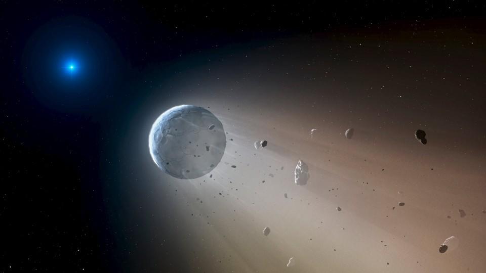 A Ceres-like asteroid is pictured slowly disintegrating as it orbits a white dwarf star in this undated handout artist's rendering in this undated handout photo obtained by Reuters October 22, 2015. Astronomers have spotted telltales signs of such an