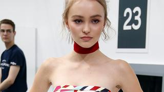 French singer Vanessa Paradis' daughter Lily-Rose Depp poses before the Spring/Summer 2016 women's ready-to-wear collection for fashion house Chanel at the Grand Palais which is transformed into a Chanel airport during the Fashion Week in Paris, France, October 6, 2015.   REUTERS/Charles Platiau