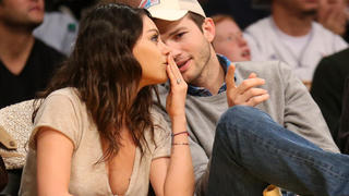 LOS ANGELES, CA - DECEMBER 19:  Actors Ashton Kucher and Mila Kunis attend the game between the Oklahoma City Thunder and the Los Angeles Lakers at Staples Center on December 19, 2014 in Los Angeles, California.  NOTE TO USER: User expressly acknowledges and agrees that, by downloading and or using this photograph, User is consenting to the terms and conditions of the Getty Images License Agreement.  (Photo by Stephen Dunn/Getty Images)