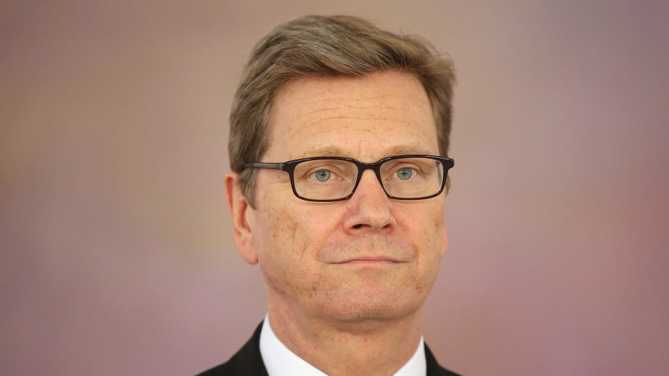 BERLIN, GERMANY - OCTOBER 22:  Outgoing German Foreign Minister Guido Westerwelle, who is a member of the German Free Democrats (FDP), waits to receive his dismissal certificate from German President Joachim Gauck at a ceremony for the outgoing German government at Bellevue Palace on October 22, 2013 in Berlin, Germany. The ministers will stay on in their functions until a new government is formed, which will most likely be a coalition between the German Christian Democrats (CDU) and the German Social Democrats (SPD). For the FDP members the ceremony today is especially poignant, as the party failed in recent German elections to receive the 5inimum of votes necessary to retain its seats in the Bundestag, which means the party no longer has political say on the federal level.  (Photo by Sean Gallup/Getty Images,)