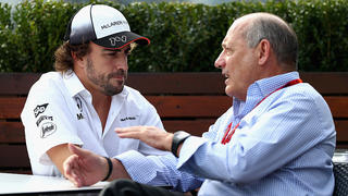 MELBOURNE, AUSTRALIA - MARCH 17:  Fernando Alonso of Spain and McLaren Honda talks with Chairman and Chief Executive Officer of McLaren Group Ron Dennis in the Paddock during previews to the Australian Formula One Grand Prix at Albert Park on March 17, 2016 in Melbourne, Australia.  (Photo by Clive Mason/Getty Images)