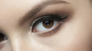 Closeup of beautiful woman eye with makeup 