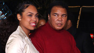 LOS ANGELES, UNITED STATES:  US former world heavyweight boxing champion Muhammad Ali (R) arrives with his daughter Hanna at the premiere of new film "Ali," which tells the story of Ali's life, in Hollywood, CA, 12 December 2001.  AFP PHOTO/Lucy NICHOLSON (Photo credit should read LUCY NICHOLSON/AFP/Getty Images)
