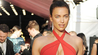Irina Shayk in a scarlet Misha Nonoo jumper with a keyhole front and halter tie at the CFDA Awards, NYC, New York.