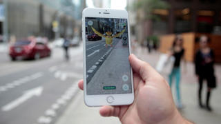 A "Pidgey" Pokemon is seen on the screen of the Pokemon Go mobile app, Nintendo's new scavenger hunt game which utilizes geo-positioning, in a photo illustration taken in downtown Toronto, Ontario, Canada July 11, 2016. REUTERS/Chris Helgren  