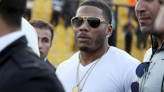 FILE- In March 13, 2015, file photo, U.S. rapper Nelly approaches the stage for a concert in Irbil, northern Iraq. Nelly is facing felony drug charges after being arrested in Tennessee, Saturday, April 11, 2015, according to a Tennessee Highway Patrol news release. (AP Photo/Seivan M. Salim, File) |
