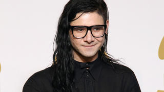 Skrillex poses backstage with the awards for best dance/electronica album "Bangarang," best remixed recording non-classical song for "Promises" and best dance recording "Bangarang" at the 55th annual Grammy Awards on Sunday, Feb. 10, 2013, in Los Angeles. (Photo by Matt Sayles/Invision/AP) |