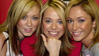 392446 01: British Pop group Atomic Kitten's Natasha Hamilton, left, Liz McClarnon and Jenny Frost pose for photographers July 26, 2001 during a photocall to promote their new single "Eternal Flame" at Tower Records, Picaddilly, London. (Photo By Anthony Harvey/Getty Images)