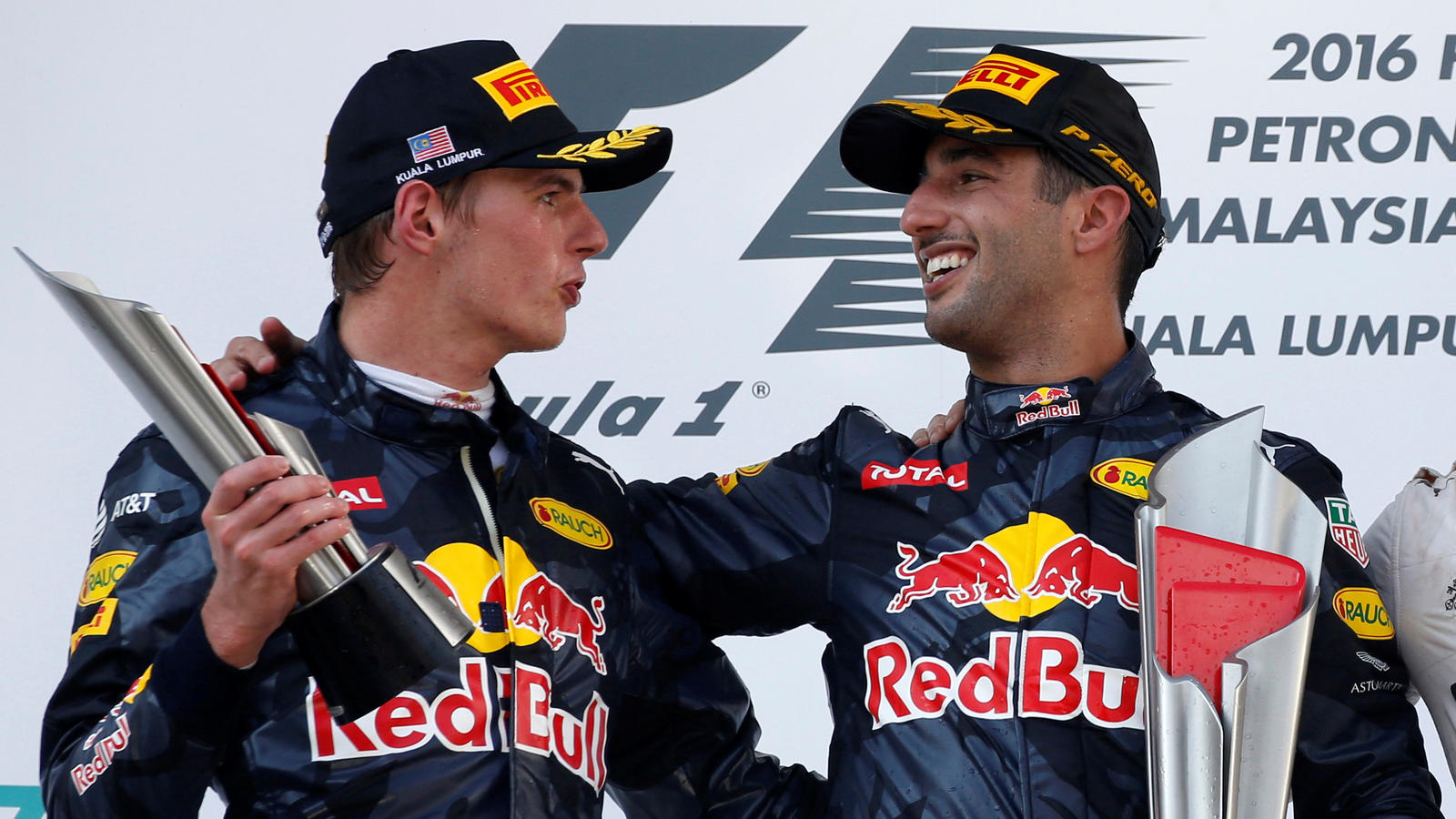 Formula One - F1 - Malaysia Grand Prix - Sepang, Malaysia- 2/10/16  Red Bull's Daniel Ricciardo of Australia celebrates with Red Bull's Max Verstappen of the Netherlands on the podium. REUTERS/Edgar Su 
