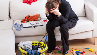 Woman who work and care of house is exhausted and stressed of her workload