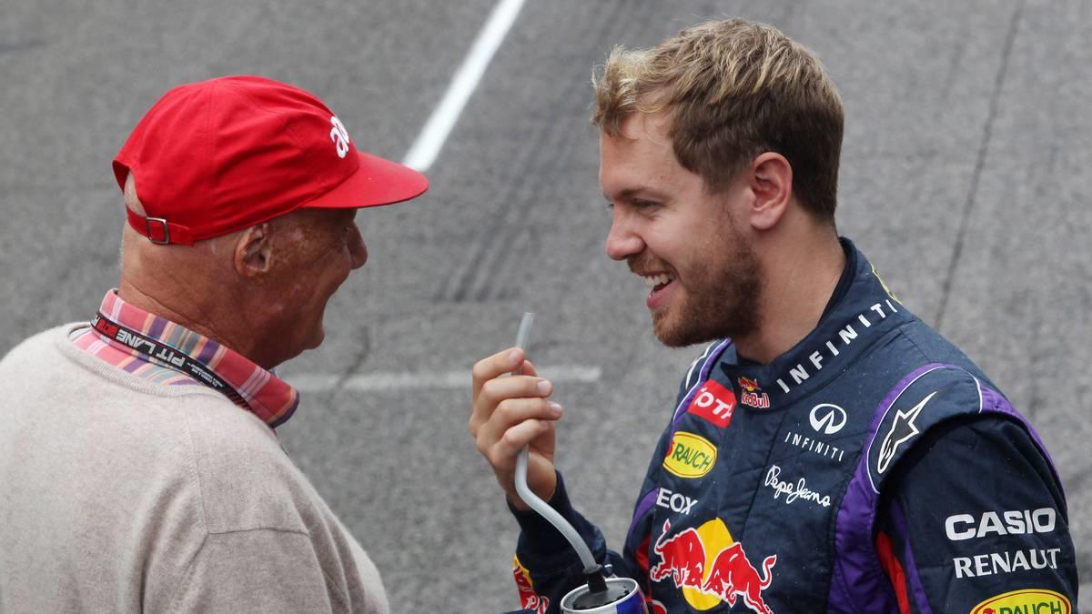 (L to R): Niki Lauda (AUT) Mercedes Non-Executive Chairman with Sebastian Vettel (GER) Red Bull Racing.24.11.2013. Formula 1 World Championship, Rd 19, Brazilian Grand Prix, Sao Paulo, Brazil, Race Day.- www.xpbimages.com, EMail: requests@xpbimages.c