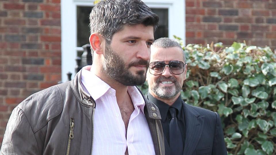 George Michael and boyfriend Fadi Fawaz leaving George's home in Hamstead, London, England.March 14th, 2012half length black white grey gray beard facial hair sunglasses shades couple suit shirt trousers jacket CAP/HIL©John Hillcoat/Capital Pictures 
