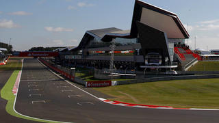 NORTHAMPTON, ENGLAND - JULY 04:  A general view of Club Corner and pit complex during practice ahead of the British Formula One Grand Prix at Silverstone Circuit on July 4, 2014 in Northampton, United Kingdom.  (Photo by Drew Gibson/Getty Images)