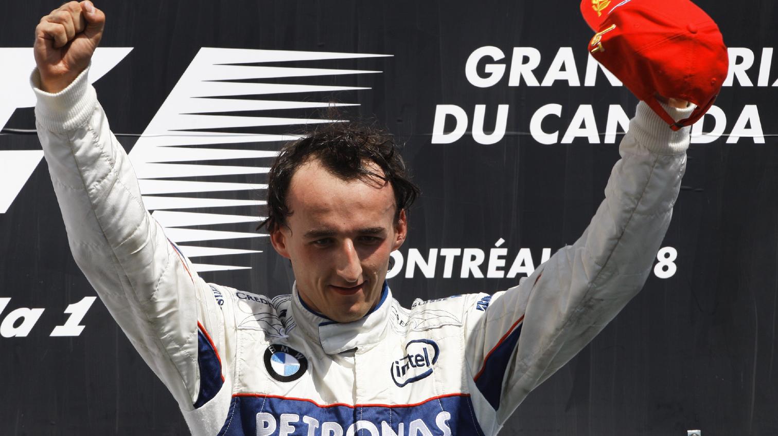 Polish Formula One driver Robert Kubica of BMW Sauber celebrates on the podium after winning the Grand Prix of Canada, Sunday 08 June 2008 in Montreal, Canada. Foto: JENS BUETTNER dpa +++(c) dpa - Bildfunk+++